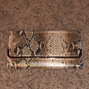Akira Clutch handbag or cross body
